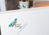 grillo's pickles dinosaur magnet on fridge 
