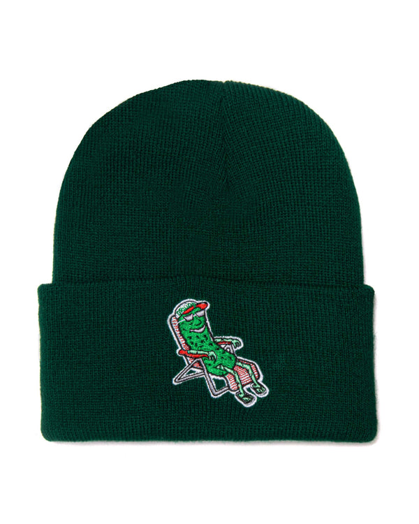 green beanie with embroidered pickle on lawn chair 