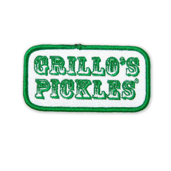 green and white embroidered patch with "grillo's pickles" on it 