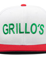 close up of green "grillo's" embroidery 