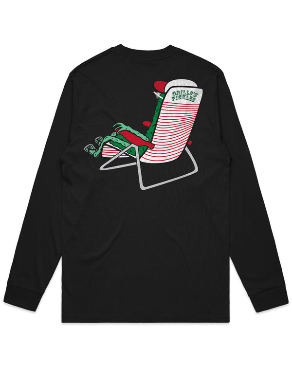 back of black long sleeve with back of pickle in lounge chair on it